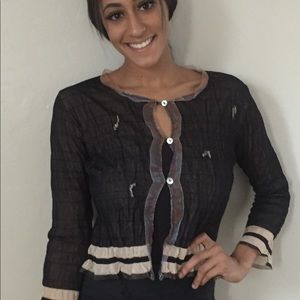 Louise della French designer top.